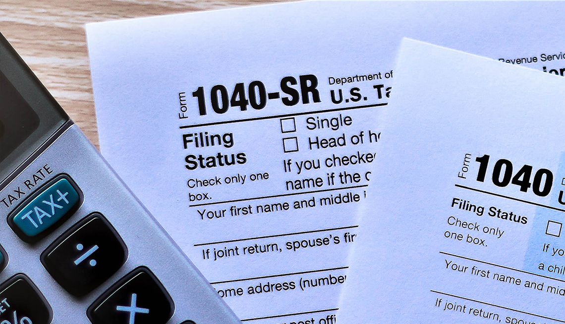 Forms 1040 and new Form 1040 SR for seniors on desktop