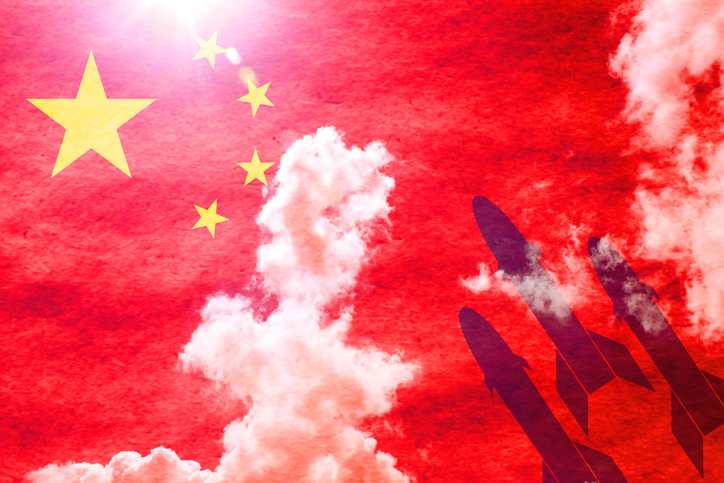 Missiles in front of sunny chinese flag
